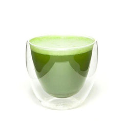 organic ceremonial matcha whisked into a beverage